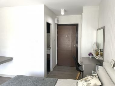 !!!Wholesale Condo @ University of the Thai Chamber of Commerce, 1 bedroom, 1 bathroom, size 21.5-28 sq m, price 2.29-3.1 million baht #Special promotion, book inside This September, free electrical appliances, air conditioner, refrigerator, electric stove, water heater, furniture, 5-foot bed, mattress, sofa, wardrobe, dressing table Don't wait, only a few units left.